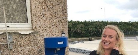 Council Officer using water refill station