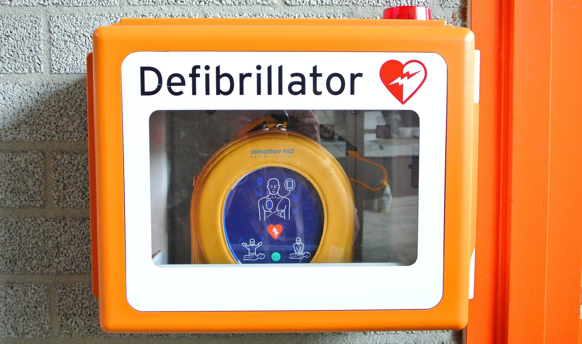 a wall mounted automatic external defibrillator