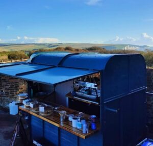 brewsters mobile coffee van at south hill barn with view of the downs