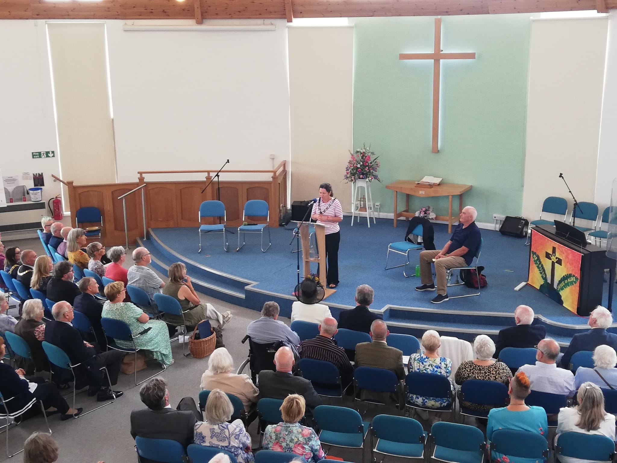 Mayor standing up giving adress to congregation in a church in Seaford East Sussex