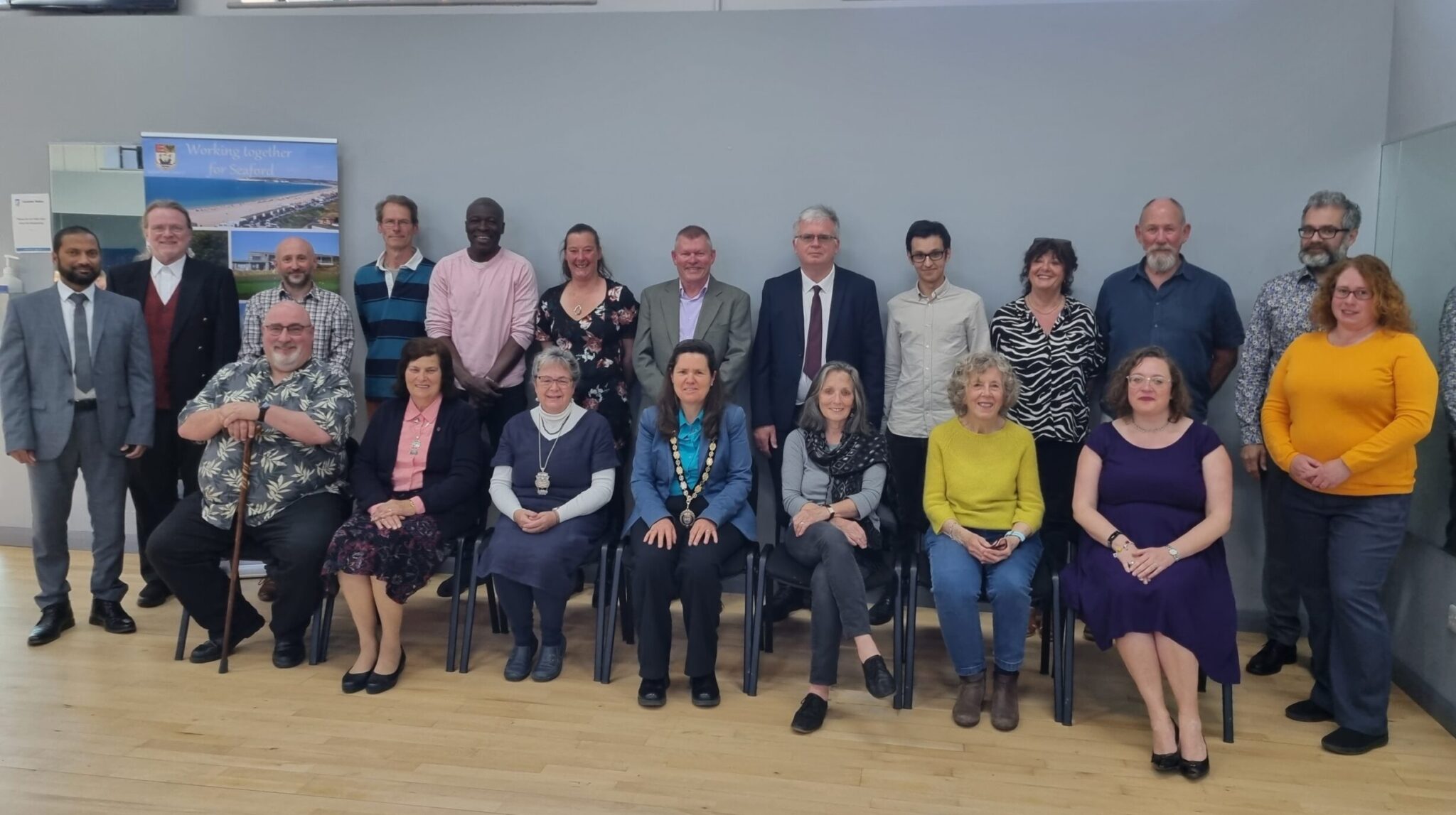 A group of 20 new councillors at Seaford Town Council grouped together having their photo taken.