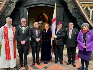 The Mayor of Seaford, Cllr Olivia Honeyman with other dignitaries standing outside St Leonard's Church in Seaford celebrating St George's Day.