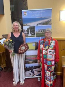 The Mayor presenting Mary Lumley with the Don Mabey award.
