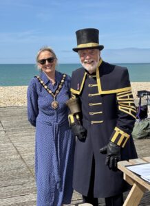 The Mayor of Seaford and Seaford's Town Crier at Sussex Day event at Seaford Seafront.