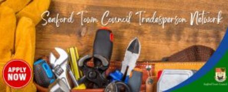 Work tools and wooden background.