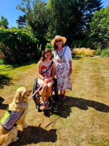  Jazz Turner, with Phoebe, her assistance dog and the Mayor of Seaford.