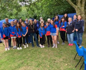 The Mayor of Seaford with the Girl Guides at a local Seaford campsite.
