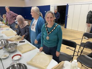 The Mayor of Seaford with volunteers making bread.