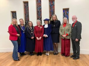 Mims Davies MP for East Grinstead and Uckfield, Cllr Karen Bedwell Mayor of Uckfield, Cllr Maggie Wearmouth Mayor of Seaford, Kathy Sanbrook OBE Vice Lord Lieutenant of East Sussex, Anne Brown High Sheriff of East Sussex, Cllr Jessica Hulbert Vice Chair of Wealden District Council, Cllr Terri Sayers Cooper of Eastbourne Borough Council ( consort to Deputy Mayor), Cllr Hugh Parker Deputy Mayor of Eastbourne Borough Council attending the Mayor of Uckfield's Christmas Carol Service.