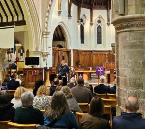 Charlotte Wicks & Sarina Stirrup singing at the carol service.