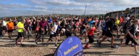 A group of runners taking part in Seaford Beach parkrun.